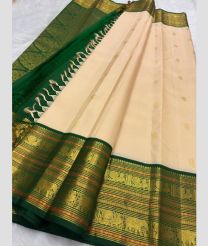 pink colour kanchi pattu sarees with All over Buttas design