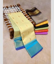 cream colour kanchi pattu sarees with All over Buttas design
