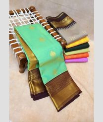 Seafoam colour kanchi pattu sarees with All over Buttas design