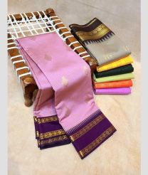 pink colour kanchi pattu sarees with All over Buttas design