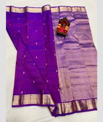 purple colour kanchi pattu sarees with All over Buttas design