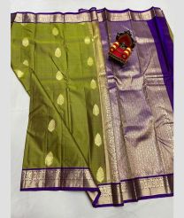 green colour kanchi pattu sarees with All over Buttas design
