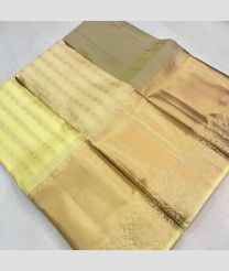 grey and cream colour kanchi pattu sarees with All over Buttas design