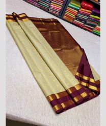 grey colour kanchi pattu sarees with All over Buttas design
