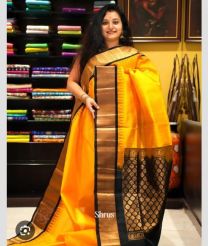 golden colour kuppadam pattu sarees with Temple Border design