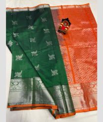 green and silver colour kuppadam pattu sarees with All over design