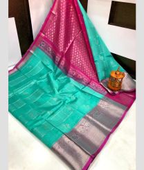 blue and silver colour kuppadam pattu sarees with Kanchi Border Desing design