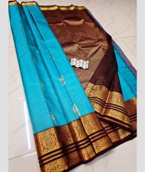blue colour kuppadam pattu sarees with All over Buttas design