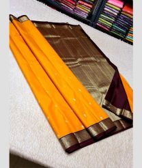 orange and silver colour kuppadam pattu sarees with All over design