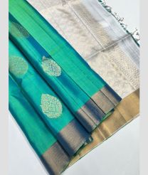 Turquoise and Half White soft silk kanchipuram sarees with All over Buttas design