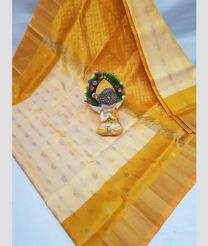 cream and gold colour uppada pattu sarees with All over Nakshtra Buttas design