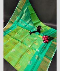 light green colour uppada pattu sarees with All over Buttas design