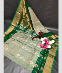 gray colour uppada pattu sarees with All over Buttas design