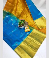 cyan and gold colour uppada pattu sarees with Kanchi Border design