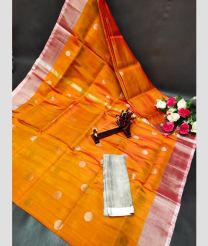 orange colour uppada pattu sarees with All over Dollar Buttas design