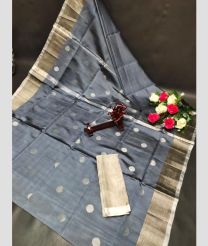 gray colour uppada pattu sarees with All over Dollar Buttas design