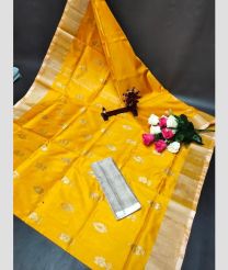 yellow colour uppada pattu sarees with All over Dollar Buttas design