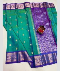 silver and green colour venkatagiri pattu sarees with All over design