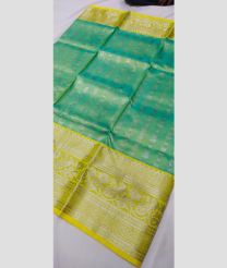 green and silver colour venkatagiri pattu sarees with All over Buttas design