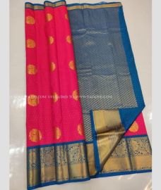 Pink and Peacock Blue color kanchi pattu handloom saree with zari border saree design -KANP0005864