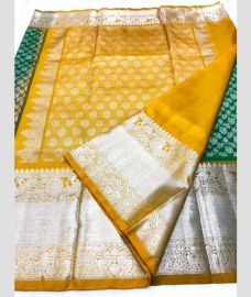 Dark Green and Mustard Yellow color venkatagiri pattu sarees with all over kalamjali design -VAGP0001148