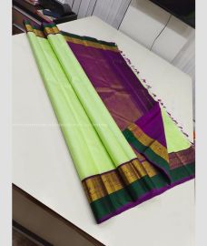 Pista and Magenta color kanchi pattu handloom saree with plain with 2g pure jari traditional korvai pattern border design -KANP0013653