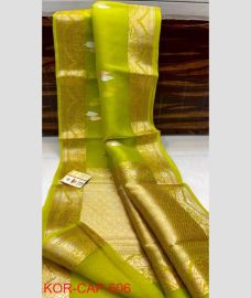 green colour banarasi sarees with All over Buttas design