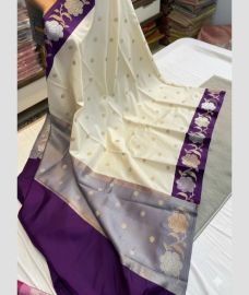 purple and cream colour banarasi sarees with All over Buttas design
