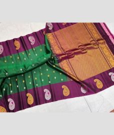 Green and Magenta gadwal pattu sarees with turning border design