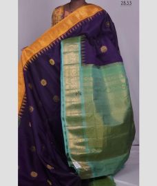 Plum Purple and Aquamarine gadwal pattu sarees with Kuttu Border design