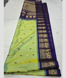 Slime Green and Navy Blue gadwal pattu sarees with All over Buttas design