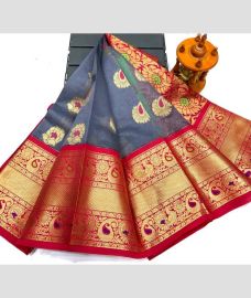 light blue and brown colour gadwal pattu sarees with All over Buttas design