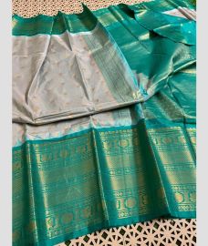 gray and brown colour gadwal pattu sarees with Temple Border design