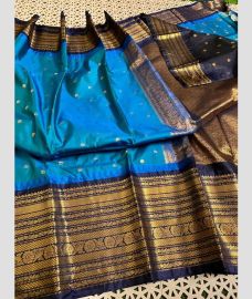 blue colour gadwal pattu sarees with Temple Border design
