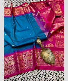 blue and magenta colour gadwal pattu sarees with Temple Border design