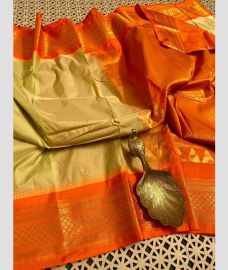 brown and orange colour gadwal pattu sarees with Temple Border design