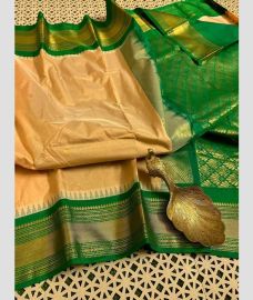 brown and green colour gadwal pattu sarees with Temple Border design