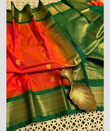 orange and green colour gadwal pattu sarees with Temple Border design