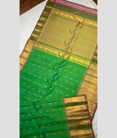 green and brown colour gadwal pattu sarees with Kanchi Border design