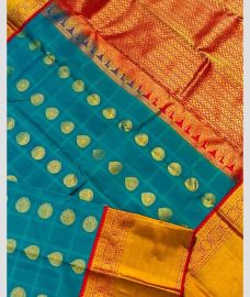 blue and brown colour gadwal pattu sarees with Kanchi Border design