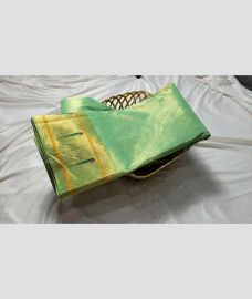 light green colour gadwal pattu sarees with All over Checks and Buttas design