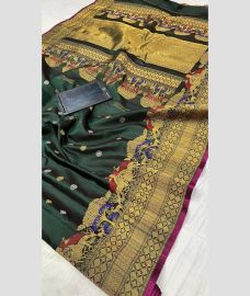 dark green colour gadwal pattu sarees with All over Buttas design