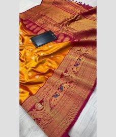 yellow colour gadwal pattu sarees with All over Buttas design