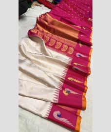 silver colour gadwal pattu sarees with All over Buttas design