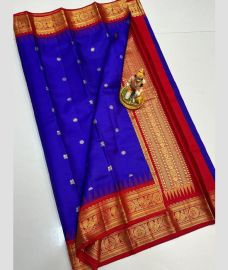 navy blue colour gadwal pattu sarees with All over Buttas design