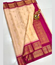 pink colour gadwal pattu sarees with All over Buttas design