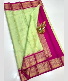 light green and purple colour gadwal pattu sarees with All over Buttas design
