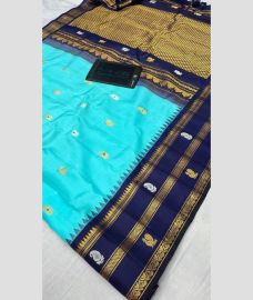 sky blue colour gadwal pattu sarees with All over Buttas design