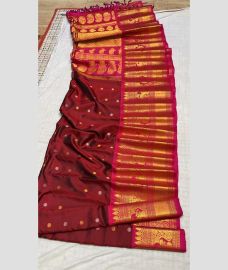 maroon colour gadwal pattu sarees with All over Buttas design