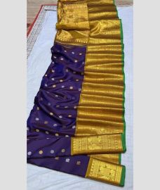 navy blue colour gadwal pattu sarees with All over Buttas design